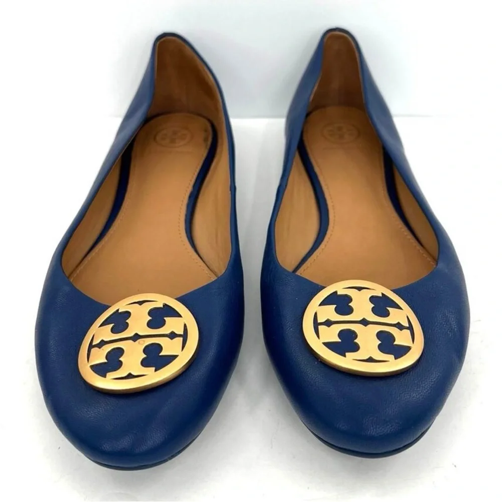 Tory Burch Navy Flats with Gold Emblem - Picture 1 of 10